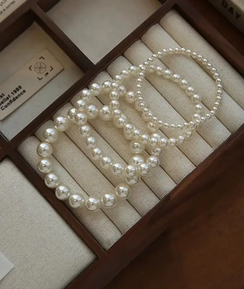 _珍珠毛衣项链的款式_珍珠项链毛衣链图片