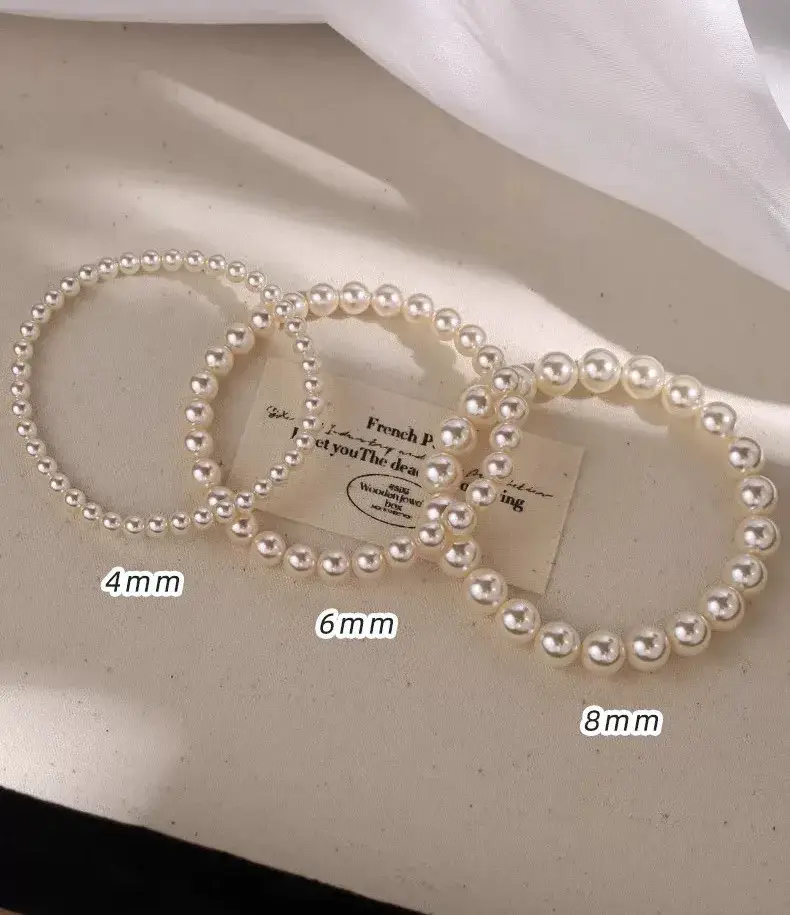 _珍珠毛衣项链的款式_珍珠项链毛衣链图片