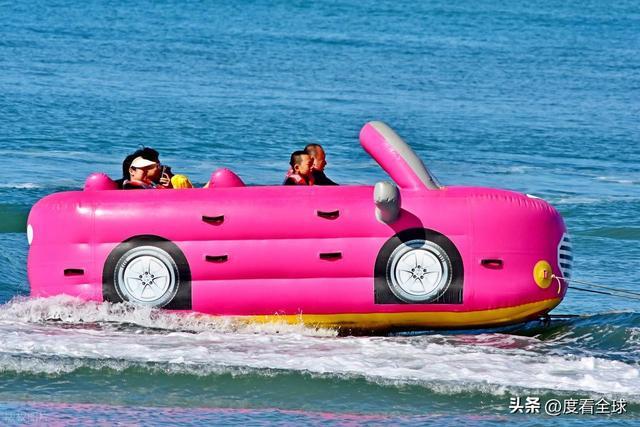 椰风裹暖意，人潮映开放：三亚湾立春前夕的自贸港活力图景！_椰风裹暖意，人潮映开放：三亚湾立春前夕的自贸港活力图景！_