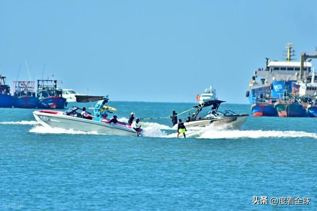 _椰风裹暖意，人潮映开放：三亚湾立春前夕的自贸港活力图景！_椰风裹暖意，人潮映开放：三亚湾立春前夕的自贸港活力图景！